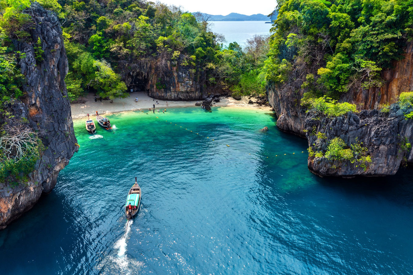 Nha Trang<br /><small style="display:block; font-size:15px;line-height:1.4;">Known for its pristine beaches and vibrant nightlife, Nha Trang offers water sports, island hopping, and mud baths.</small>